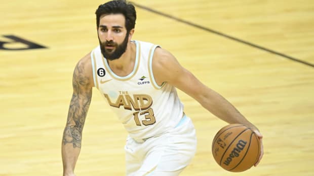 Cavaliers point guard Ricky Rubio dribbles a ball in a game.